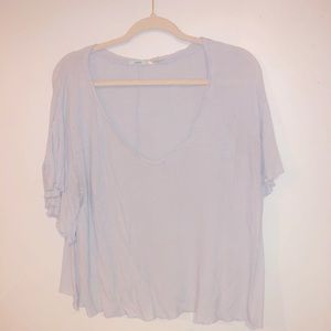 Medium, light blue top.
